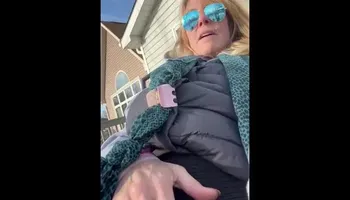 Blonde MILF fingering masturbating outside until she cums
