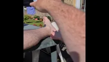 Hot feet cool down water pour wet foot and sock pull off