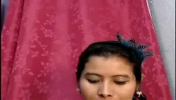 A shy cutie showing single boob on cam.