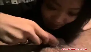 Skinny Asian MILF eats cock and balls