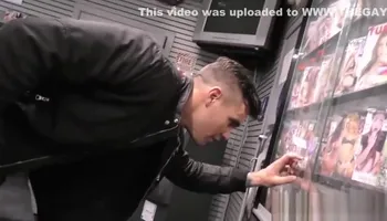 Black men sharing a whiteboi at a gloryhole
