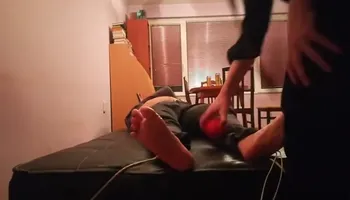 Bare feet tickle tortured