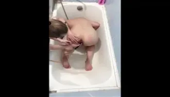 Russian Amateur girl makes the guy an enema of compulsion and submission