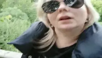 BBW blondy smoking outside and show hot lips