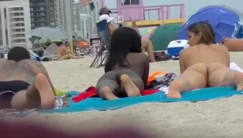 EXHIBITIONIST WIFE #98- HEATHER TAKES HER HUBBY HER GIRLFRIEND TO THE NUDE BEACH! VOYEUR POV